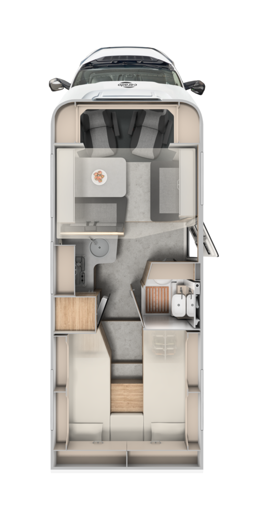 Plan d’aménagement Carado avec lits jumeaux à l’arrière, coin salon, cuisine et salle de bain, vue de dessus