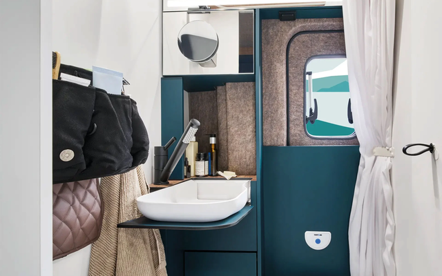 The fold-down sink creates space exactly when it's needed.